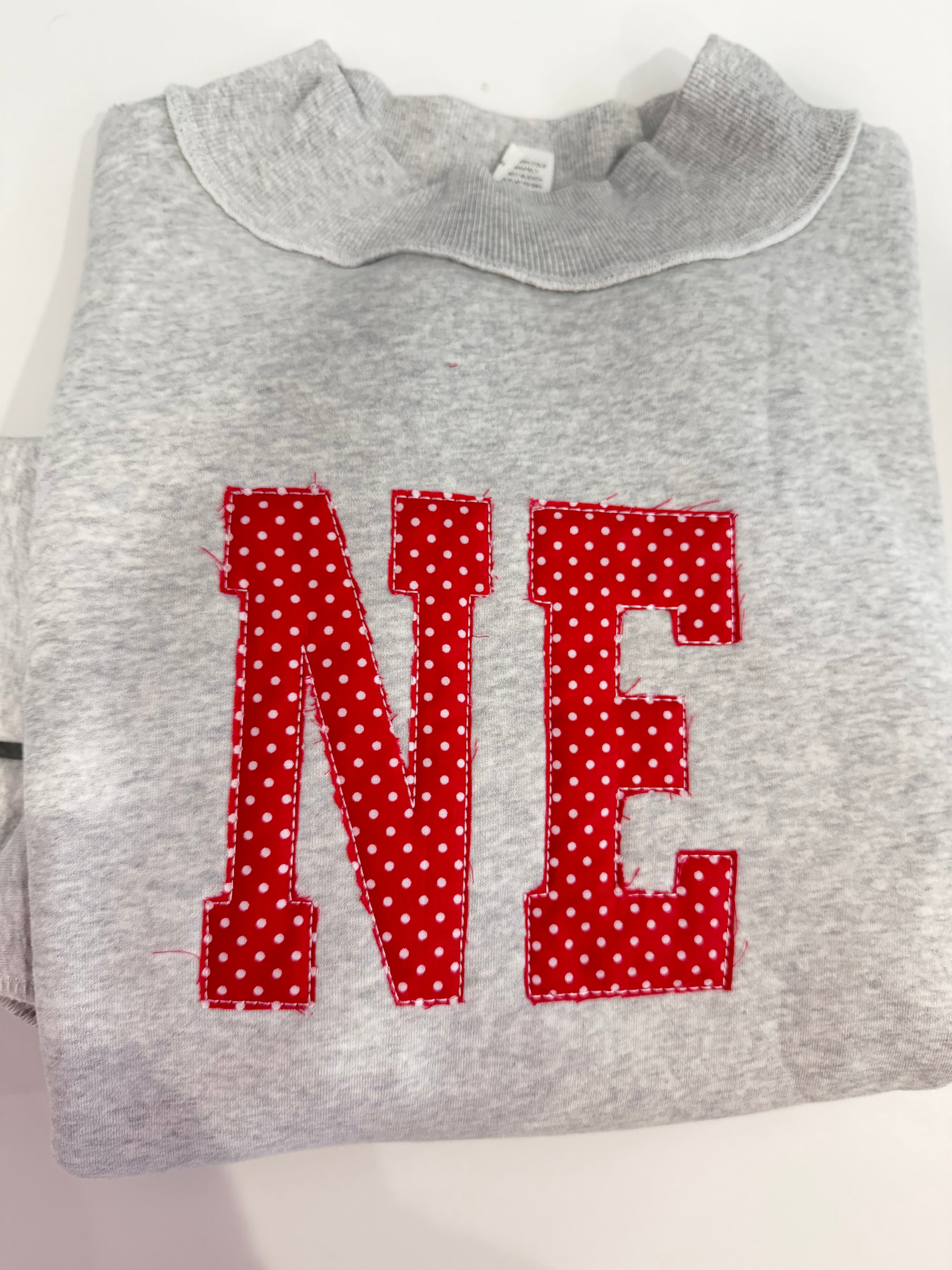 custom red polkadot mockneck