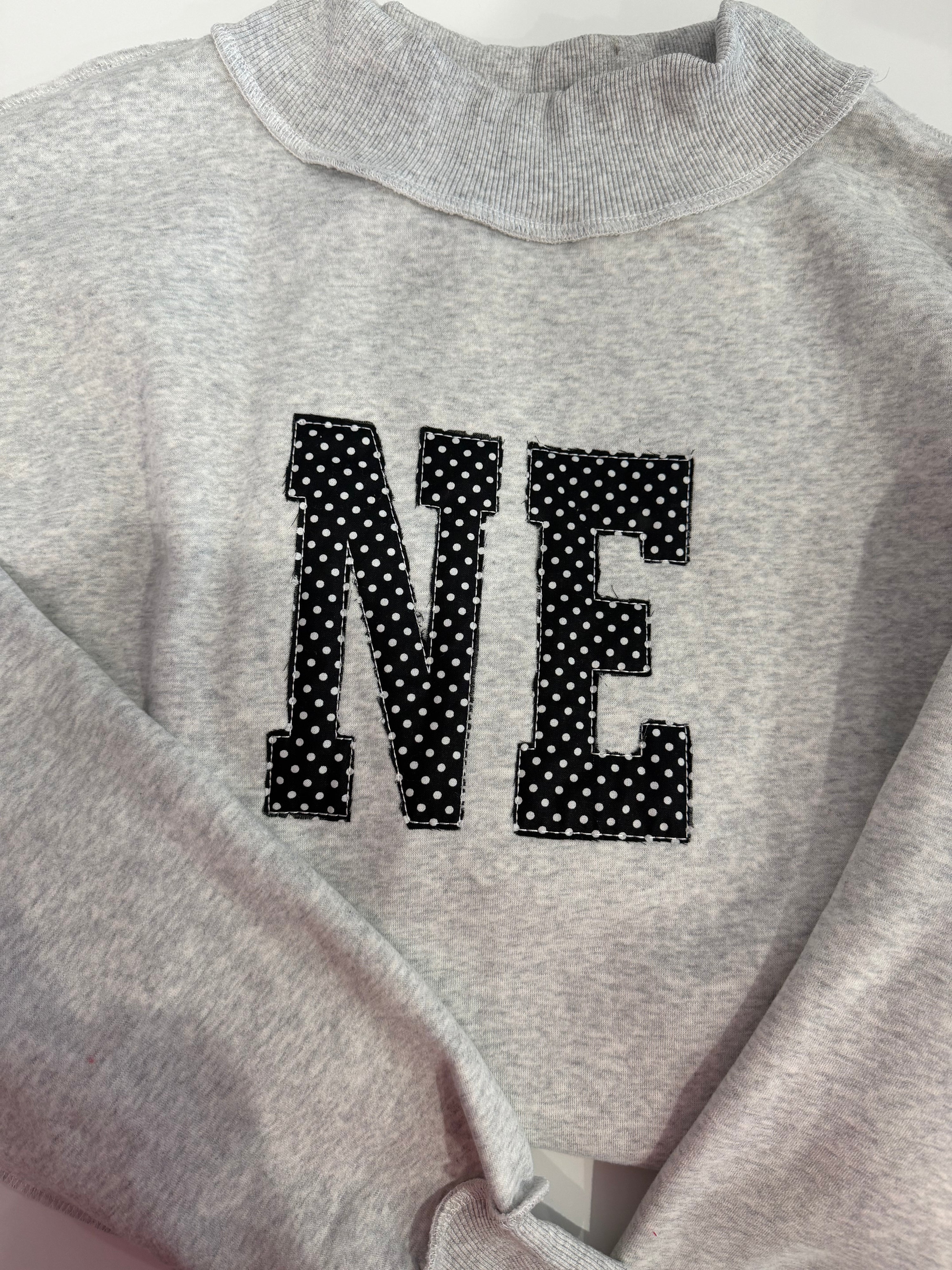 custom black polkadot mockneck