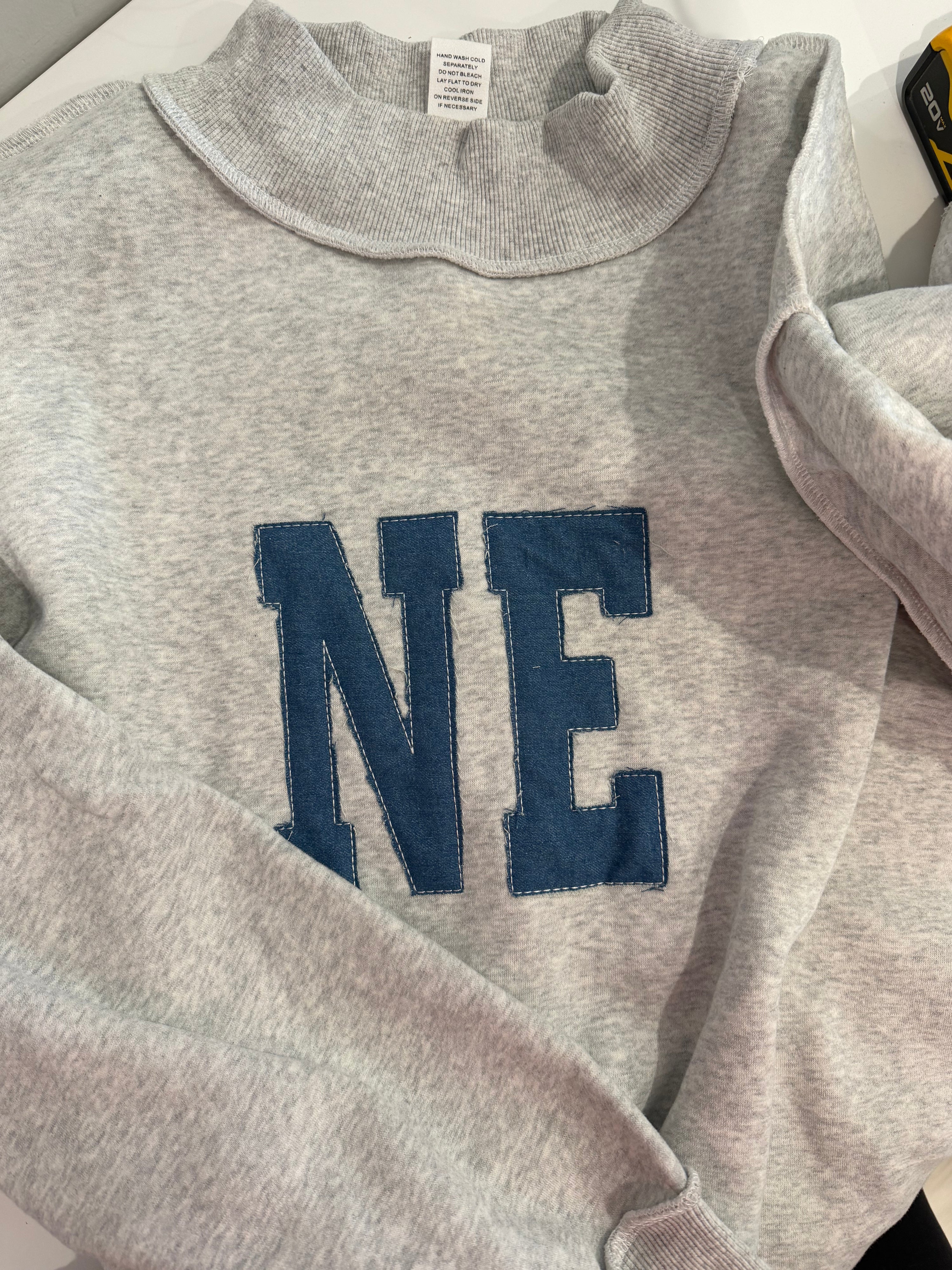 custom denim mockneck
