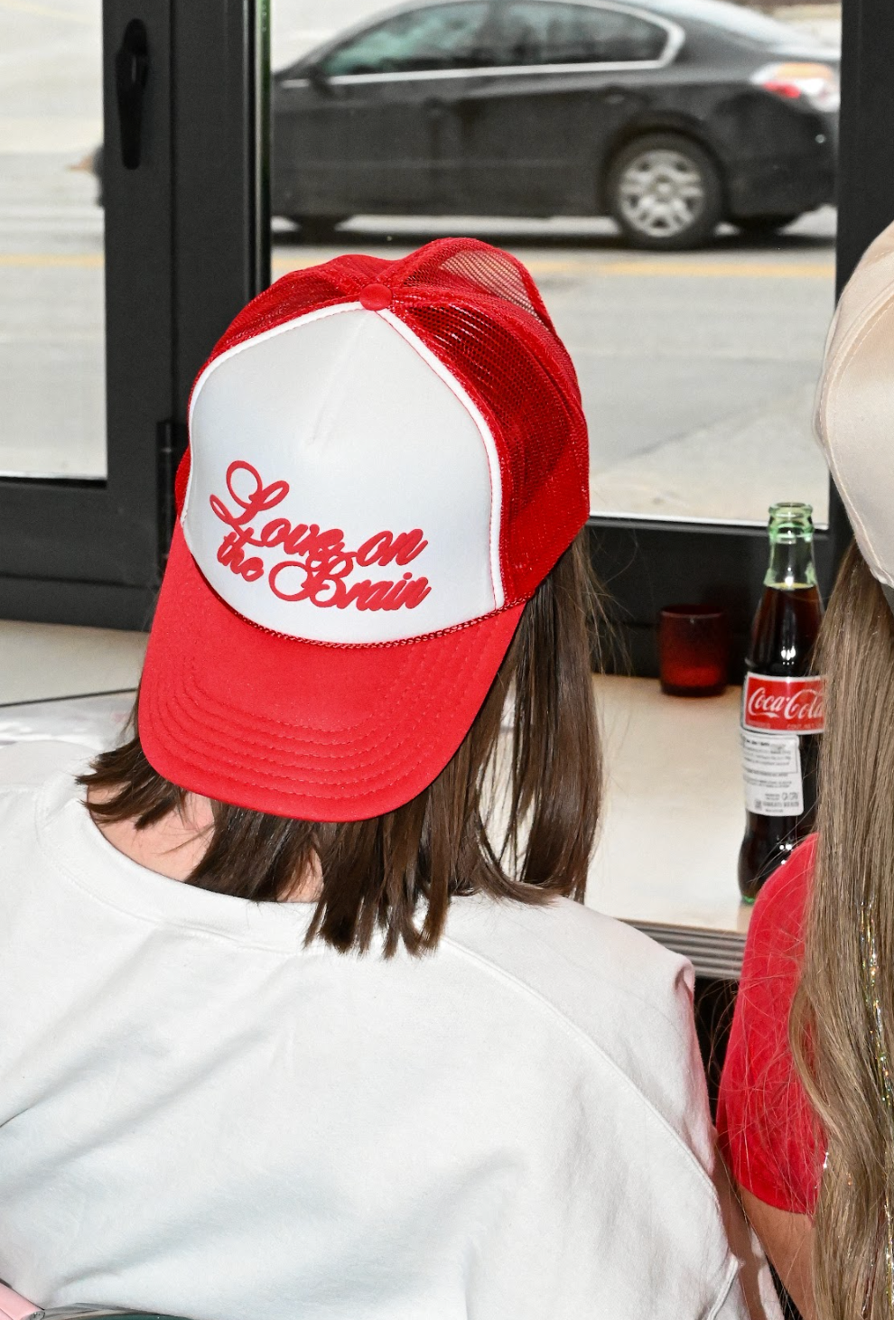 love on the brain trucker hat