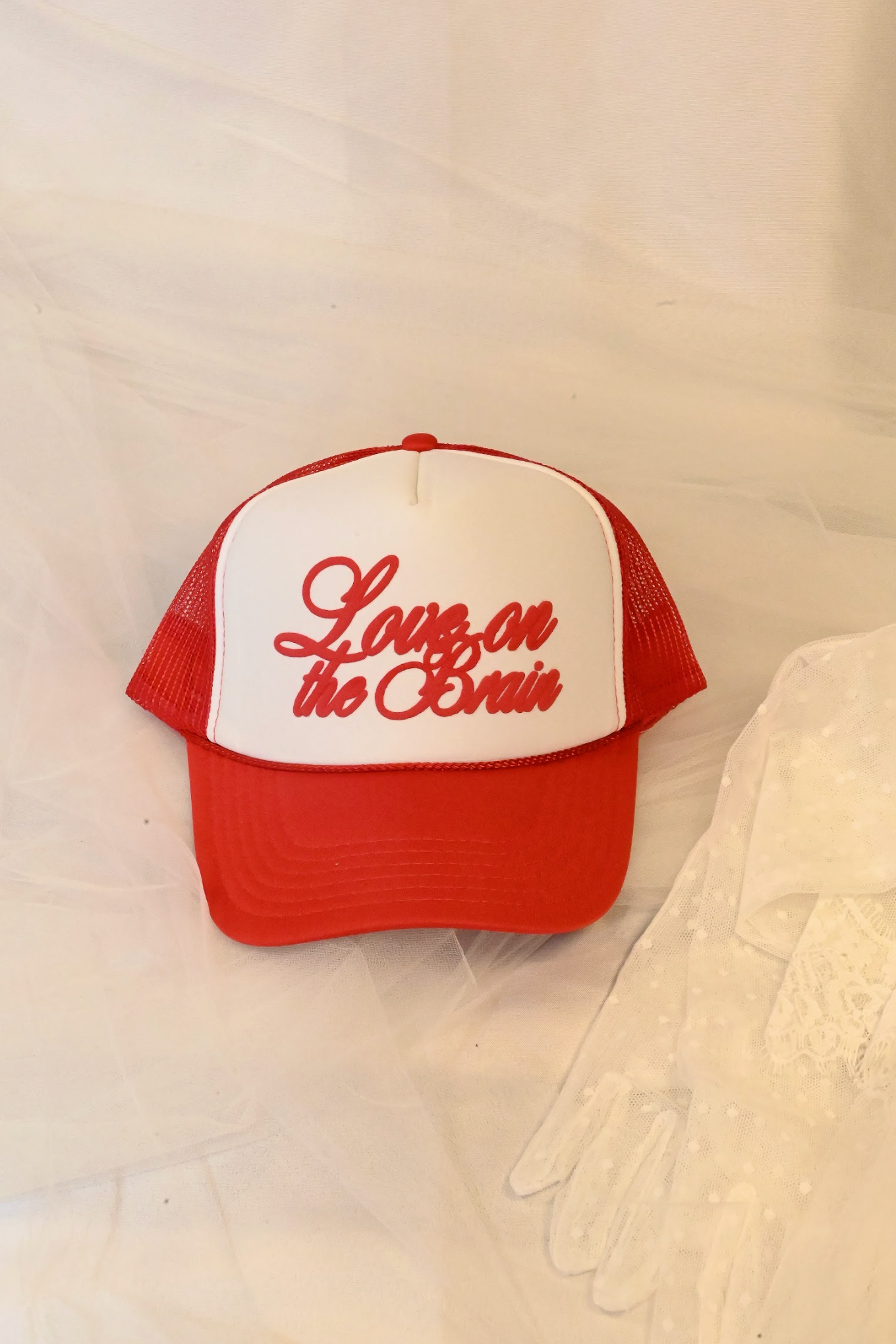 love on the brain trucker hat